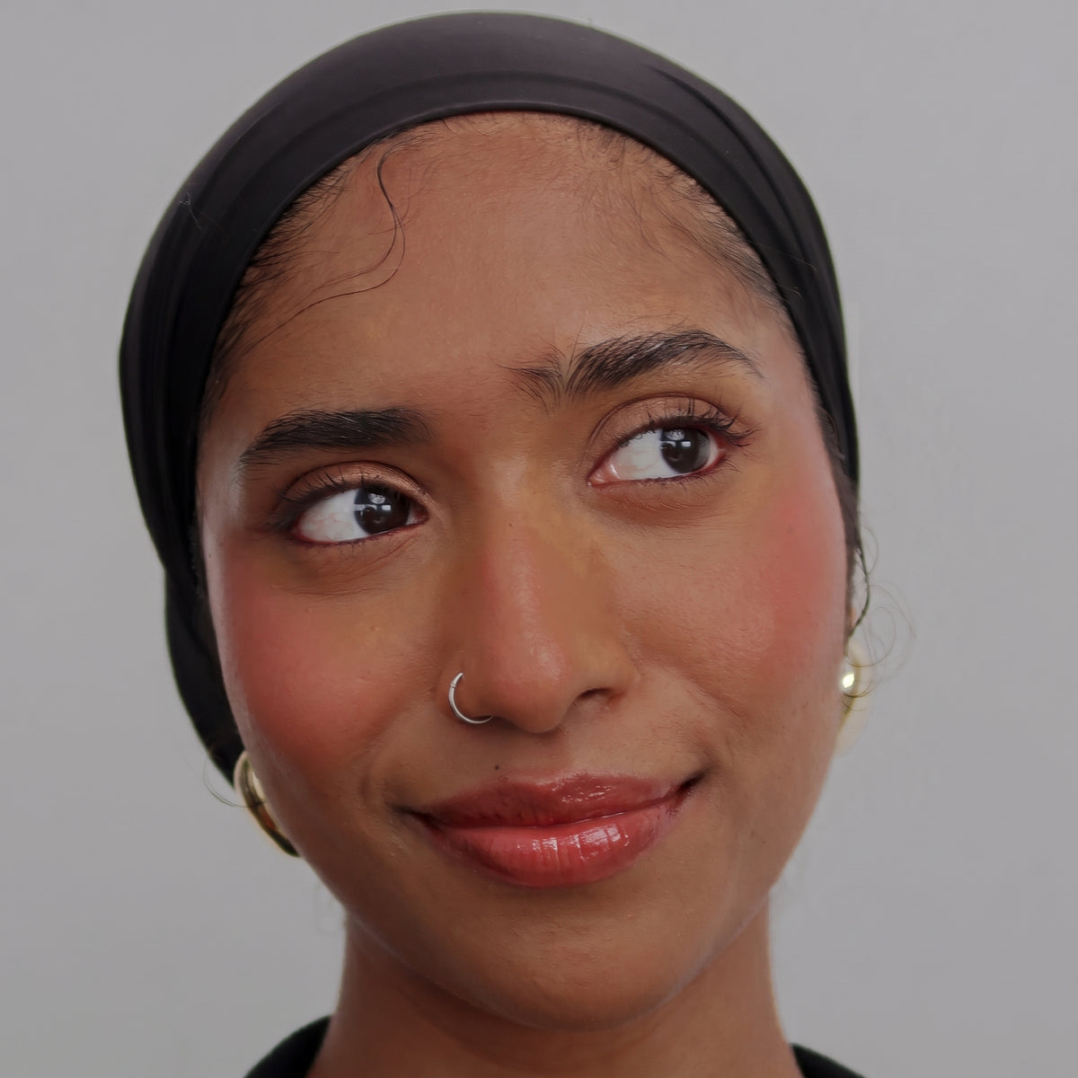 Peptide Glo Lip Oil in Cherry Jam worn on model (1 of 4)