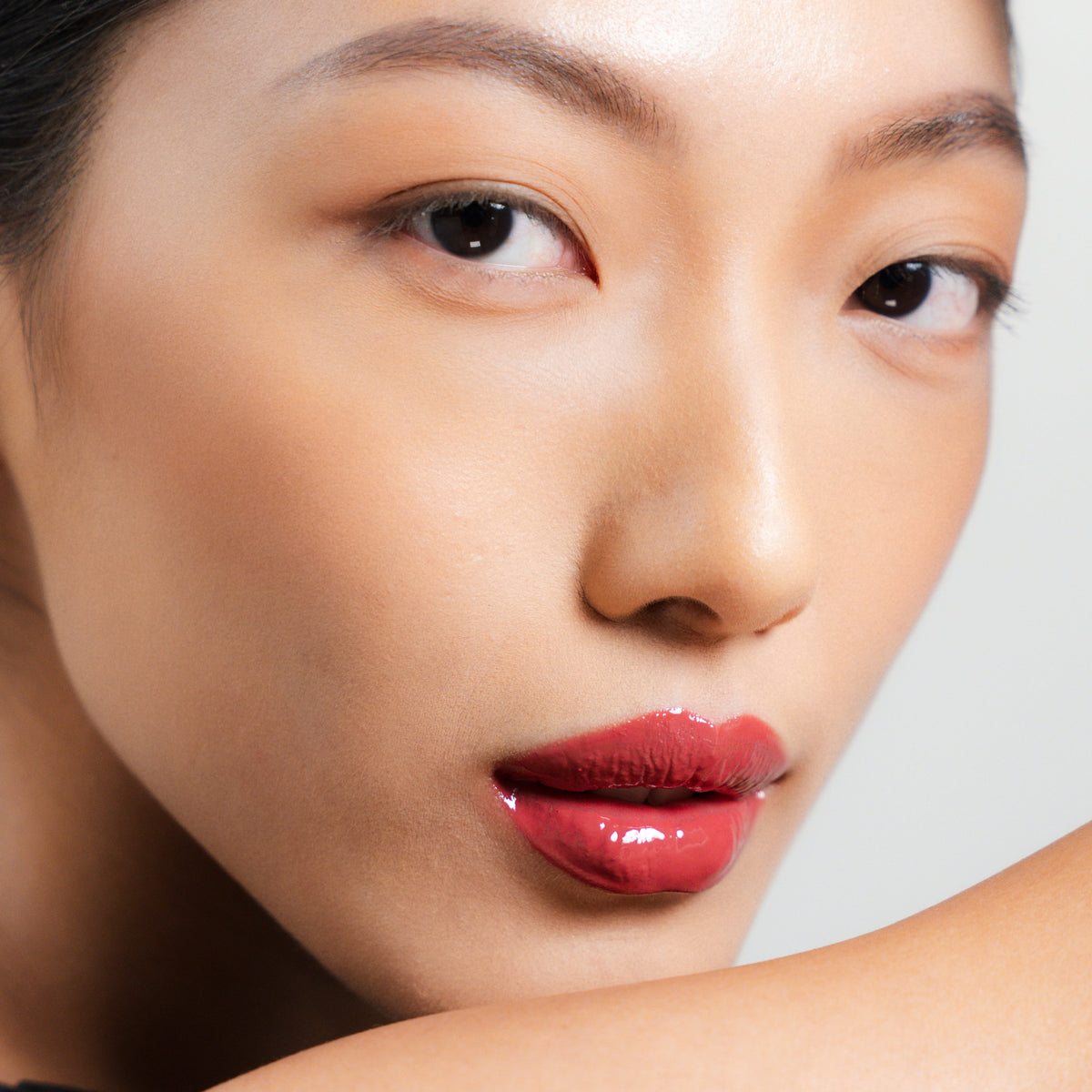 Peptide Glo Lip Glaze in Crush on fair skin
