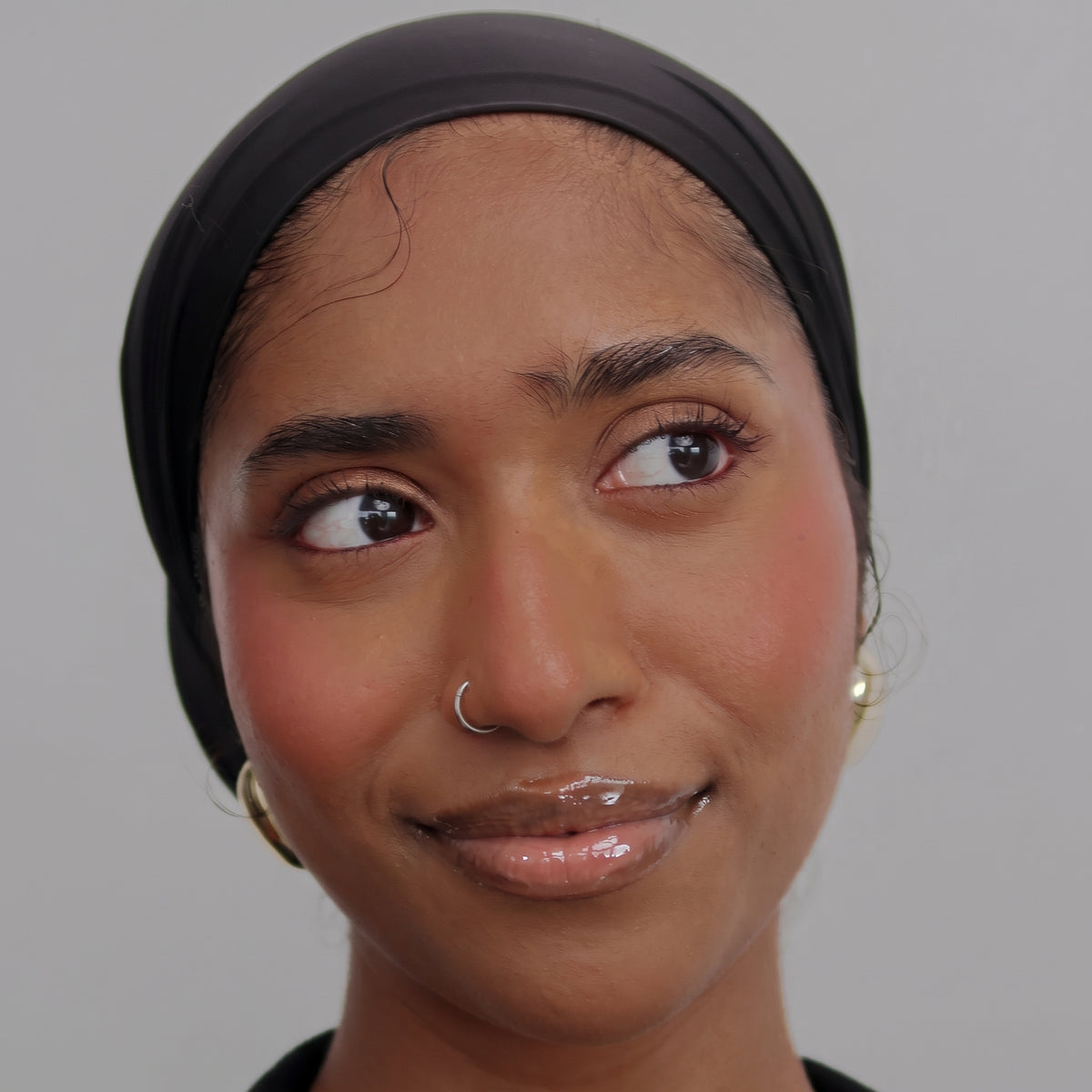 Peptide Glo Lip Oil in Crystal Clear worn on model (1 of 4)