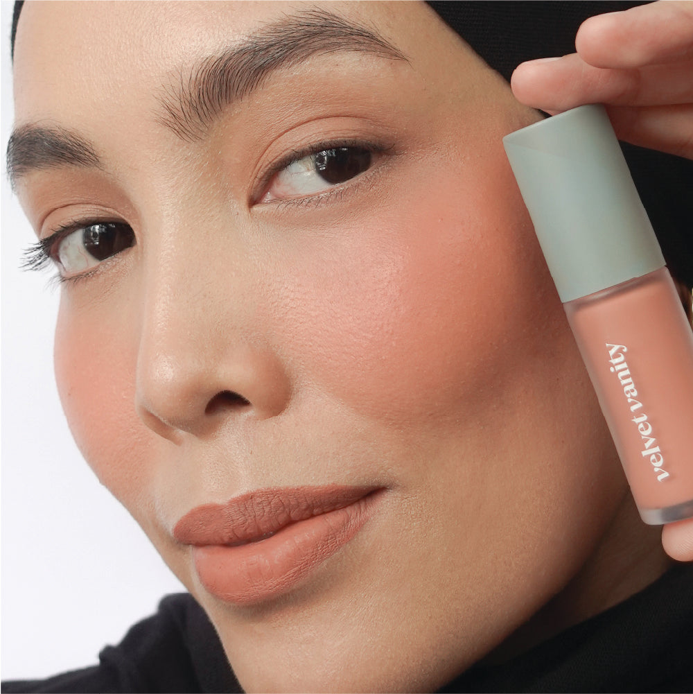 Hyaluronic Liquid Blush in Just Peachy on medium skin