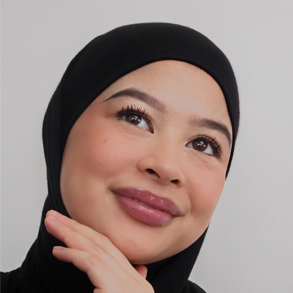 Peptide Glo Lip Oil in Mauvewood worn on model (4 of 4)