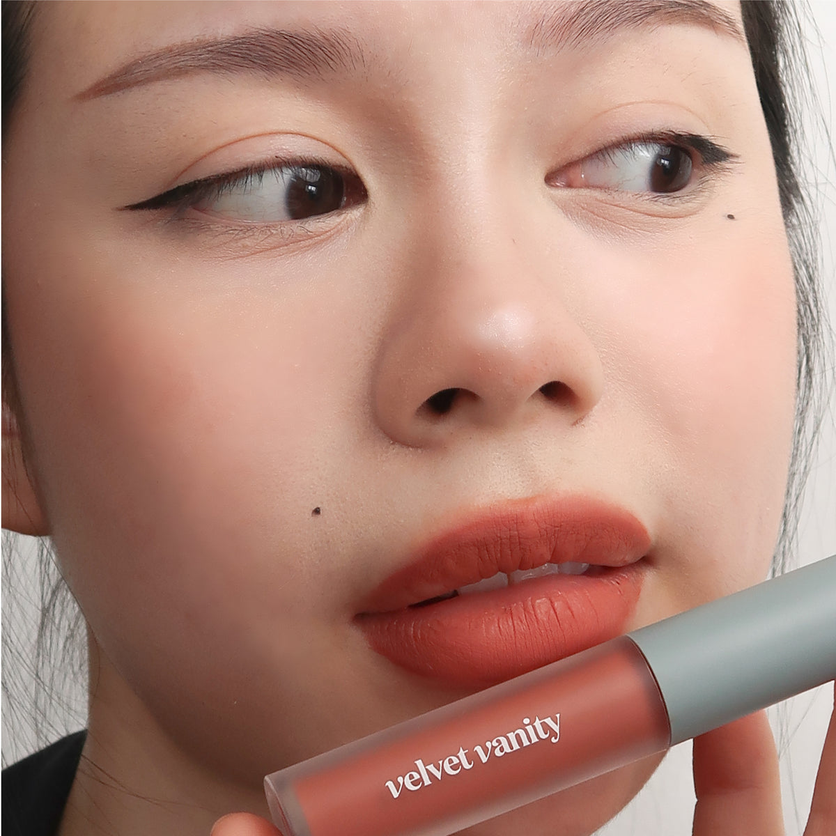 Peptide Hydra-Matte Lipstick in Born Rich on fair skin