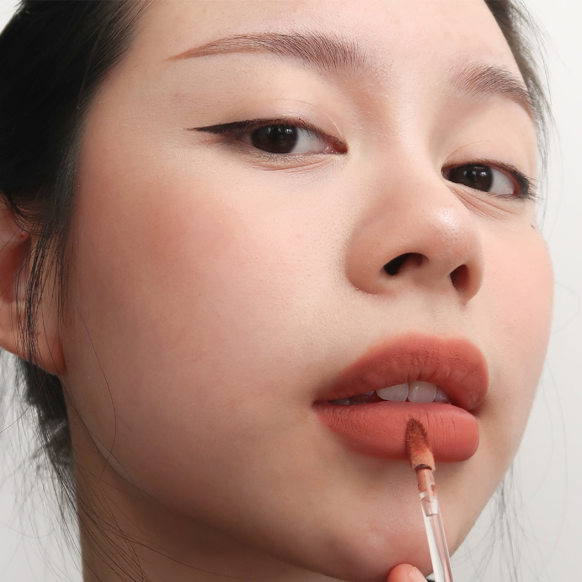 Peptide Hydra-Matte Lipstick in Got Lucky on fair skin
