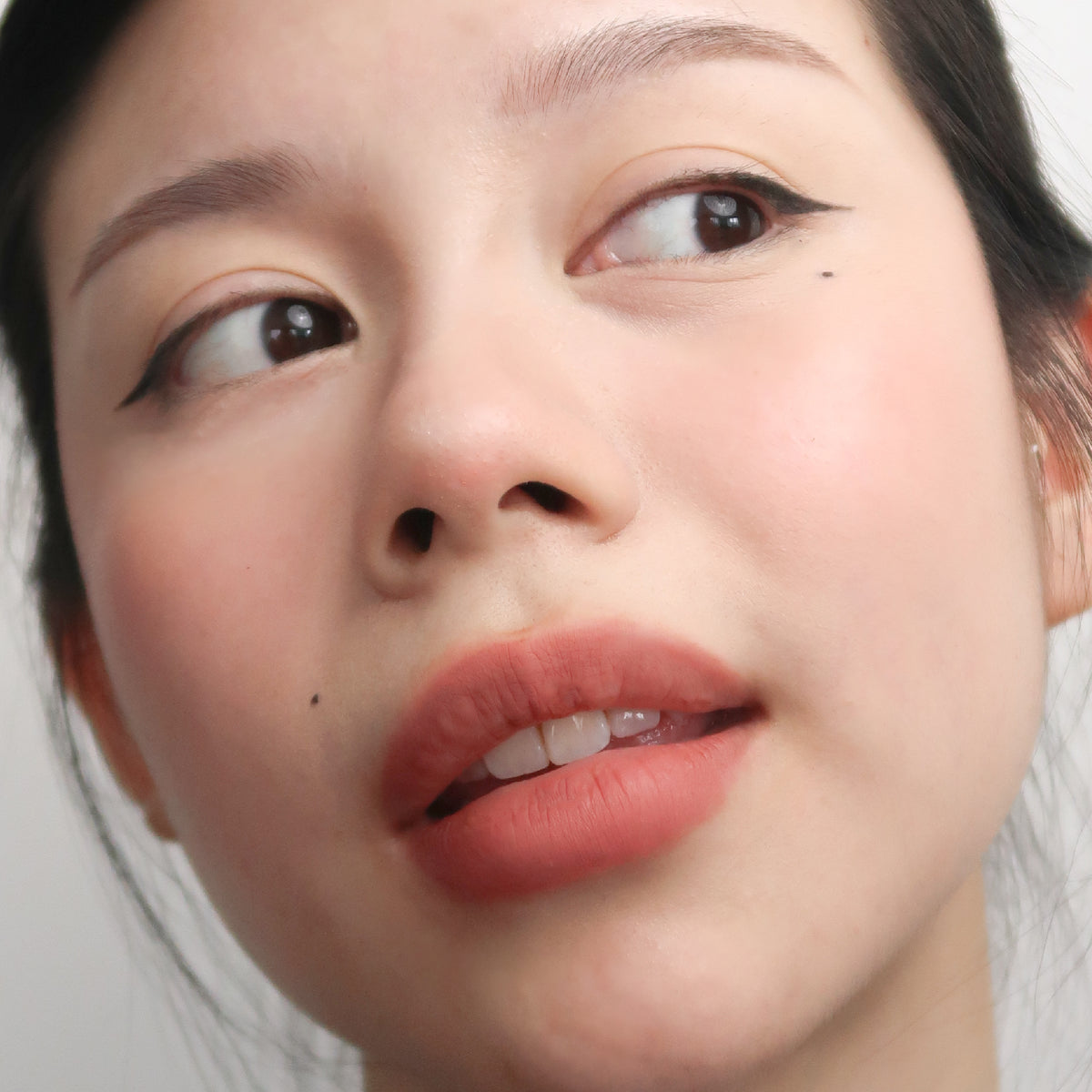 Peptide Hydra-Matte Lipstick in High Profile on fair skin