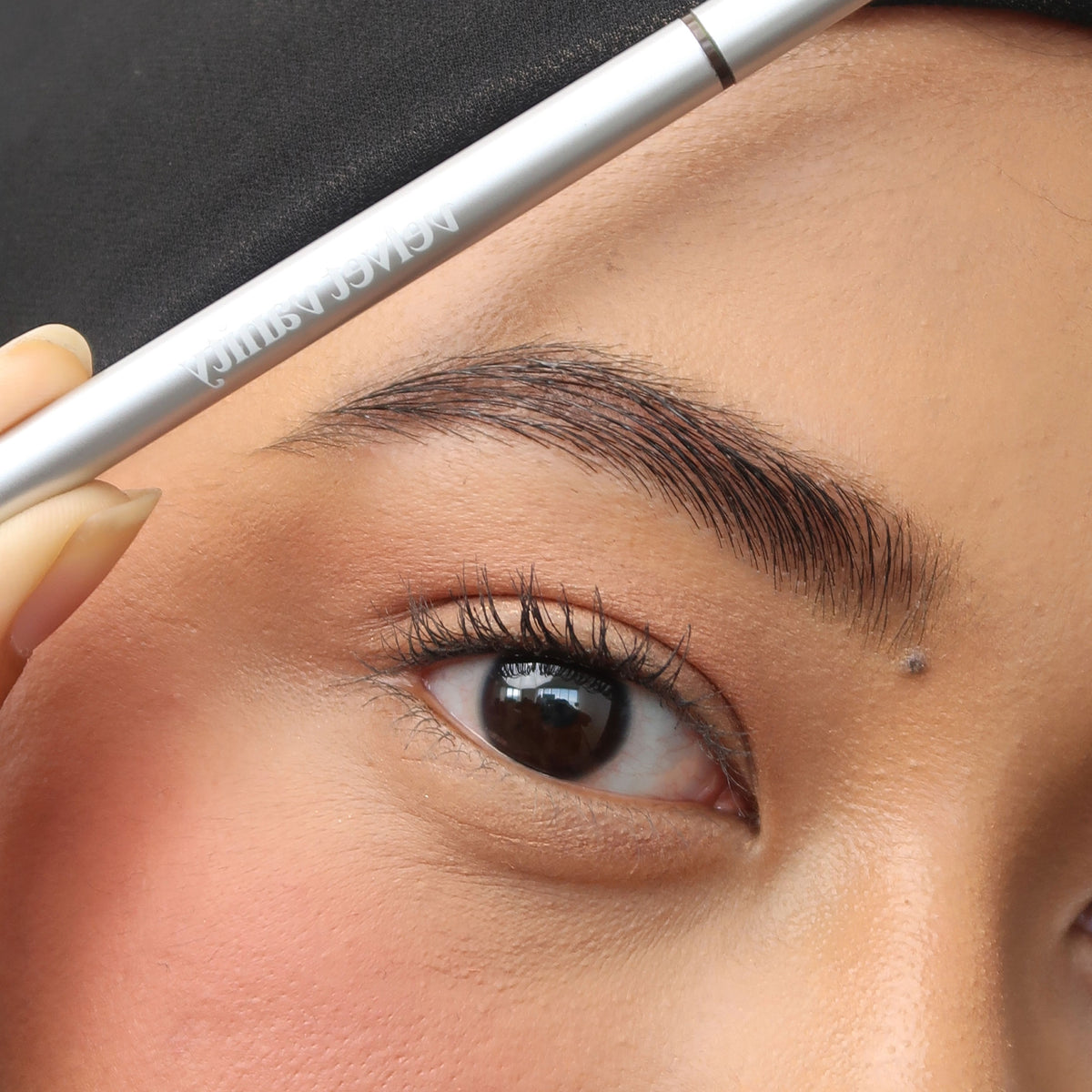 Soft Trace Brow Pencil in Smokey Grey on medium skin