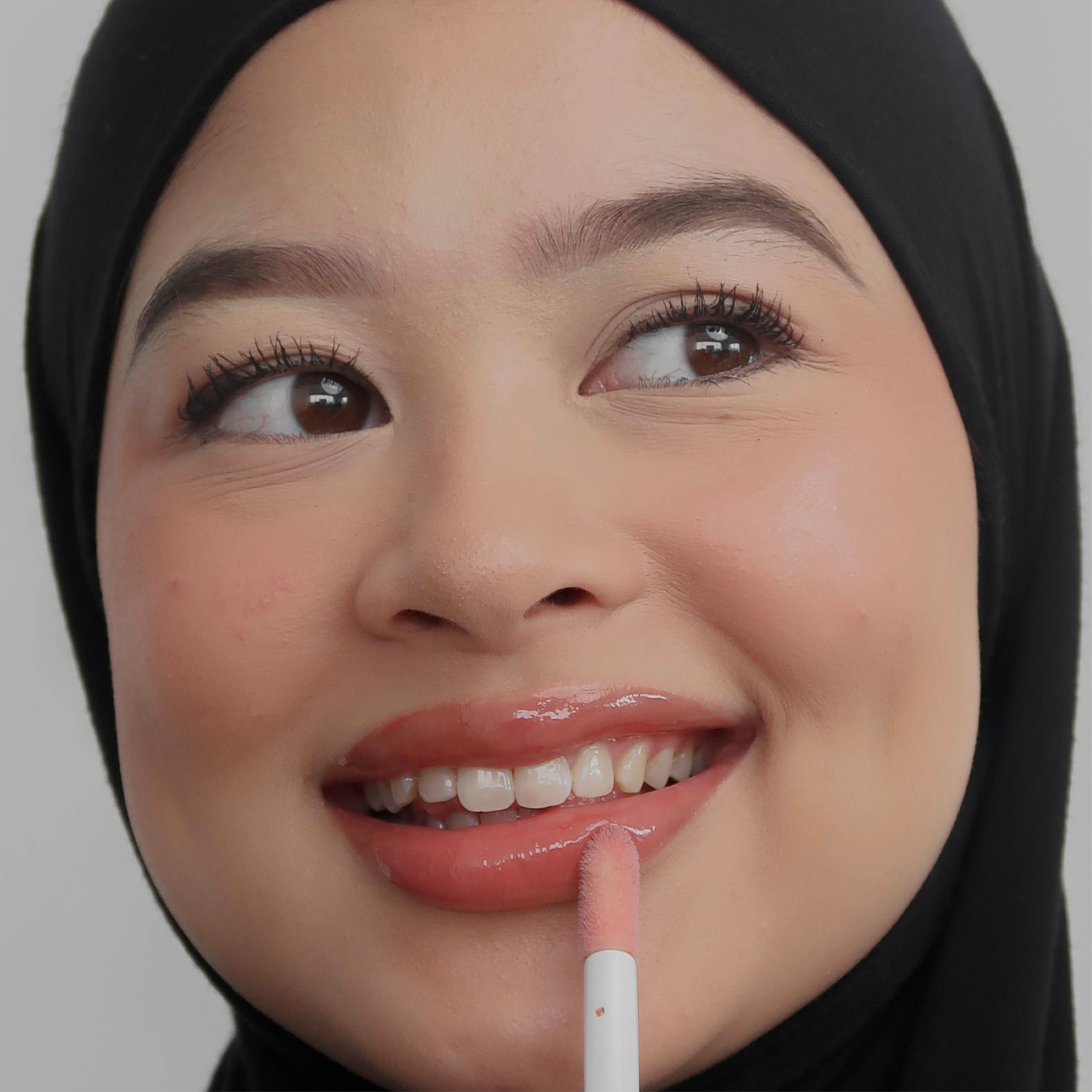 Peptide Glo Lip Oil in Honey Toast