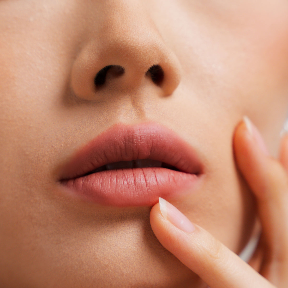 Soft Blur Glide-On Lipstick in Blush on fair skin