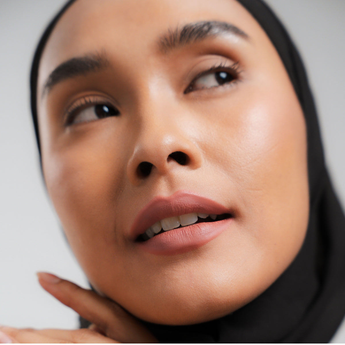 Soft Blur Glide-On Lipstick in Buff on medium skin