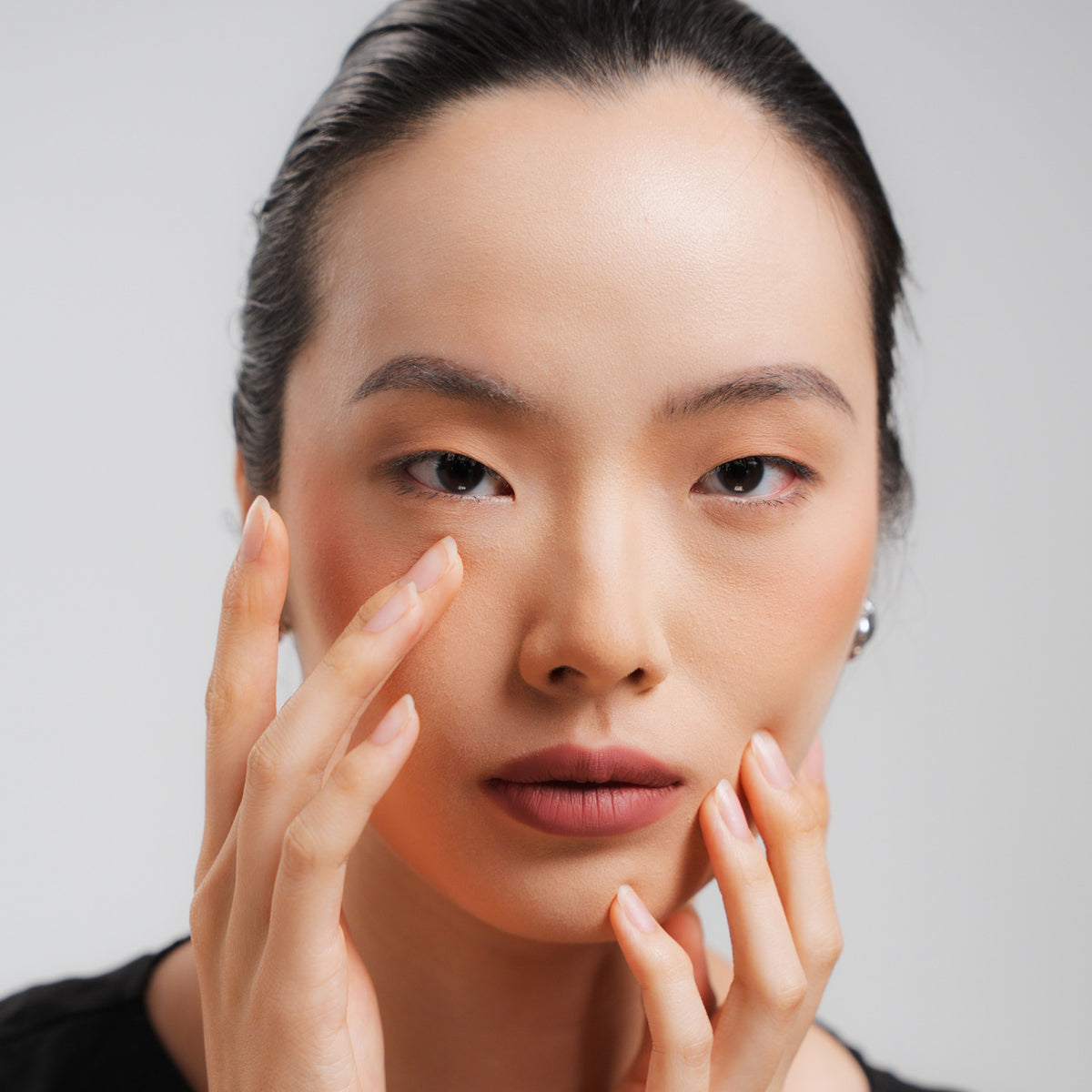 Soft Blur Glide-On Lipstick in Hush on fair skin