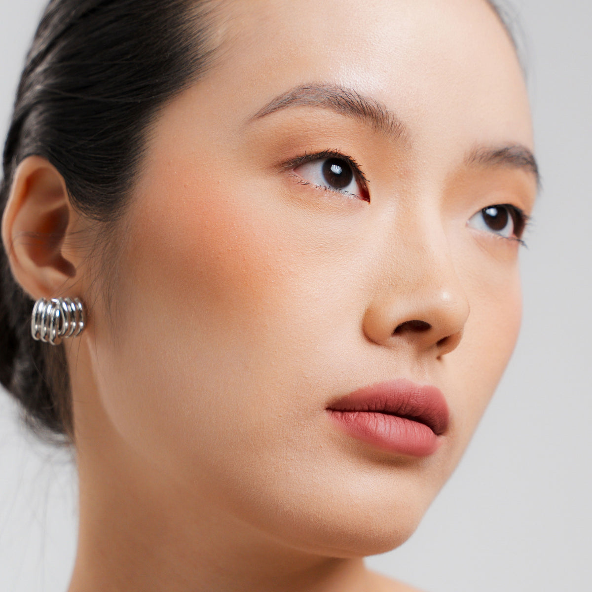 Soft Blur Glide-On Lipstick in Whimsy on fair skin