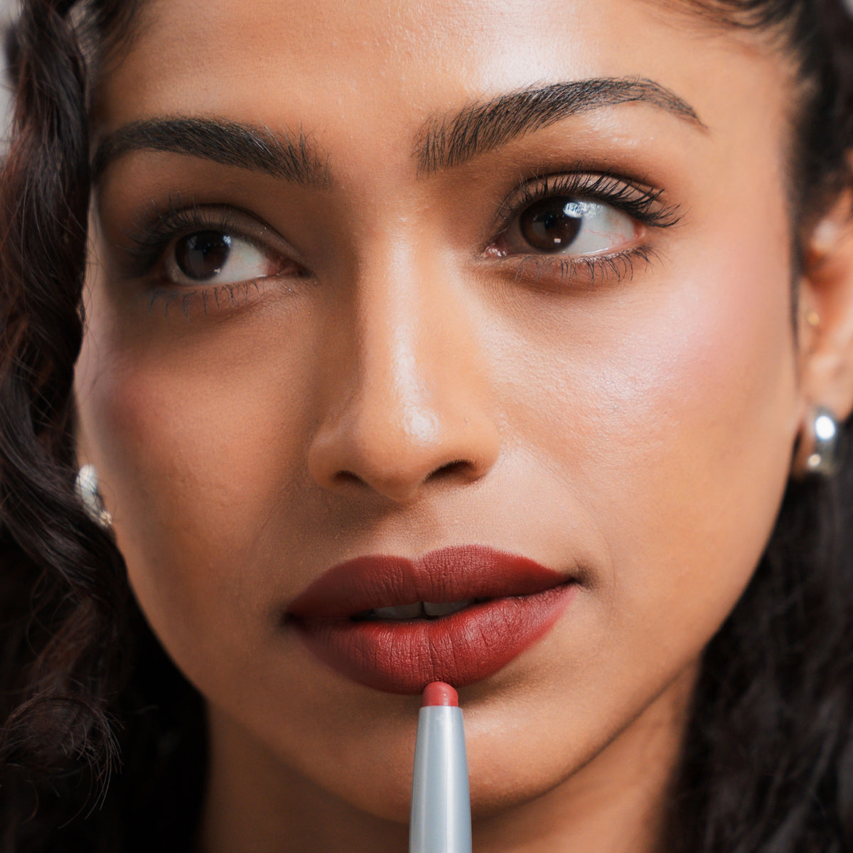 Soft Blur Lip Liner in Runway on tan skin