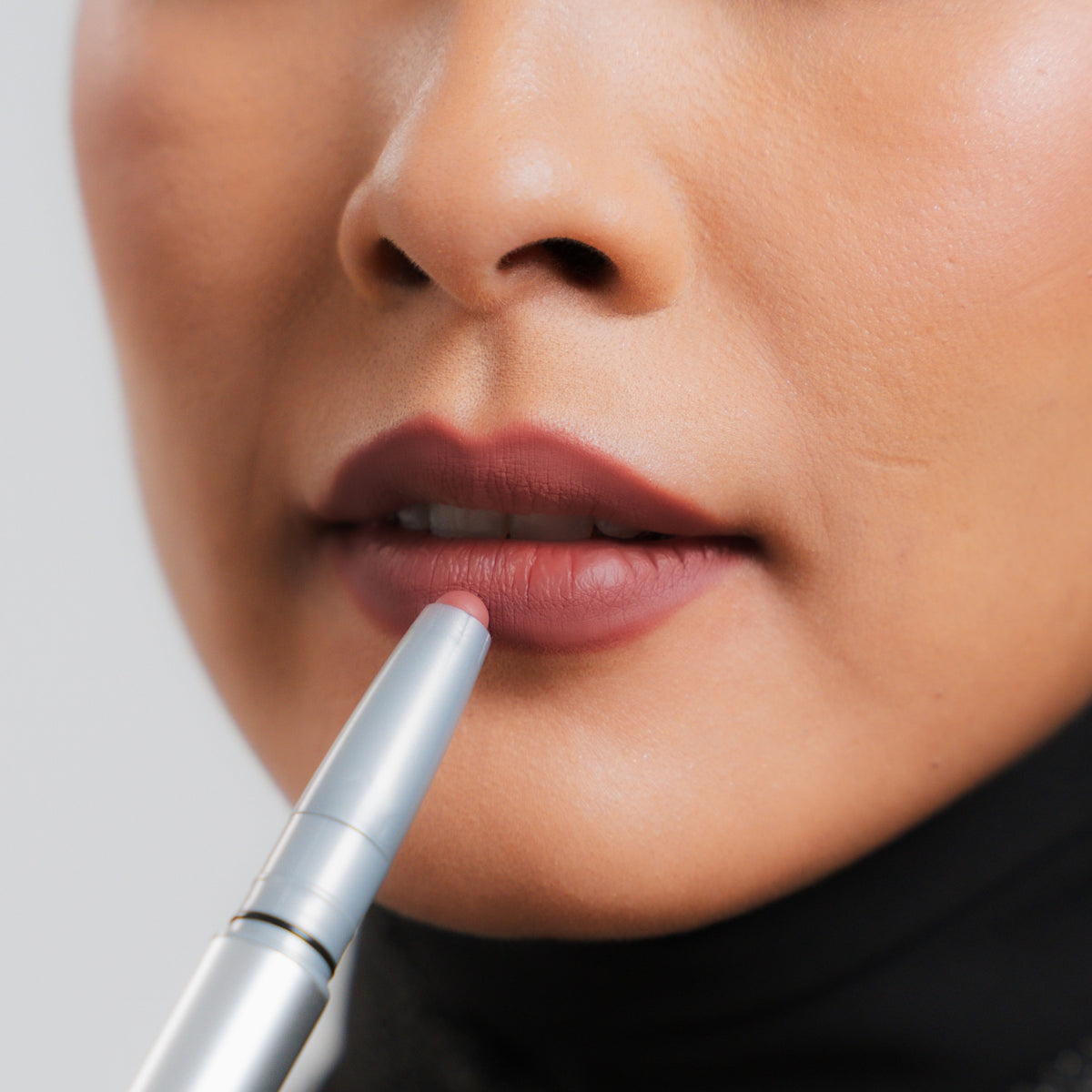 Soft Blur Lip Liner in Suede on medium skin