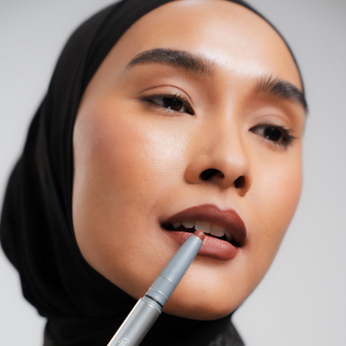 Soft Blur Lip Liner in Toast on medium skin